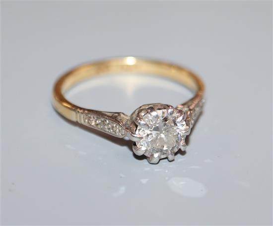 A diamond solitaire ring, in plat and 18ct with diamond-set shoulders, original ivorine box, size R.